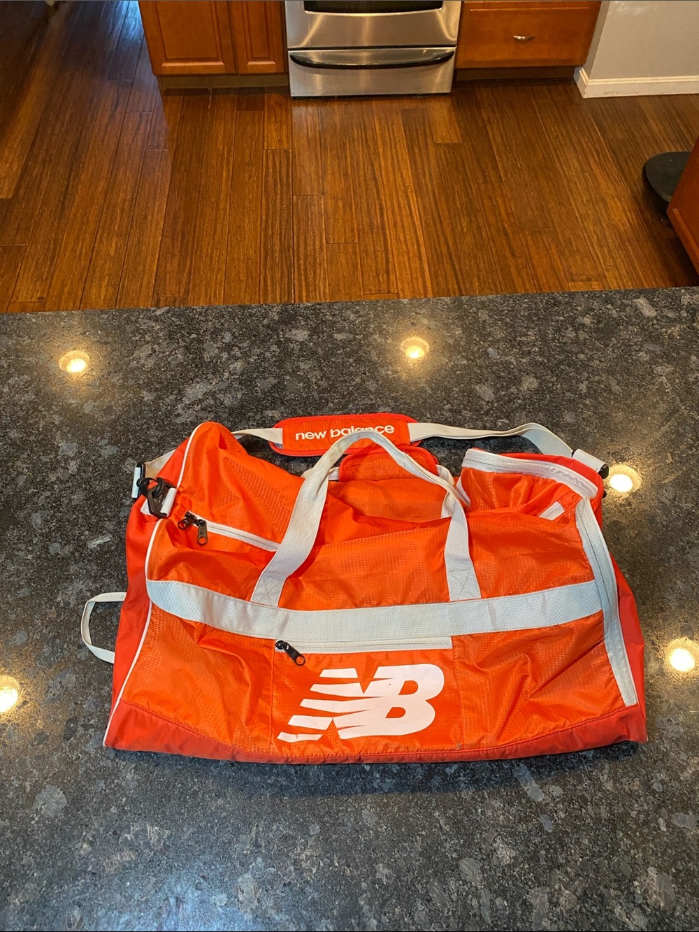 New Balance Orange Duffel Bag with White Accents Large Shoulder Strap